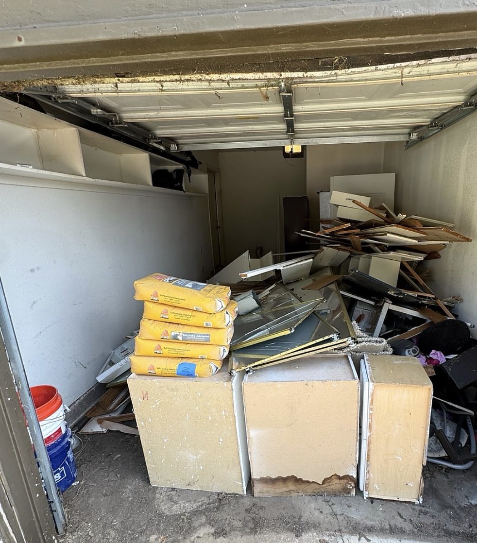 Before junk removal — packed garage